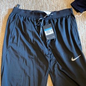 Nike men’s reflective running joggers NWT